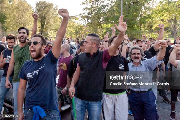 Casapound's extreme right-wing supporters shout as they clash with the anti-fascists in front of the Fourth Town Hall, where the future of a centre...