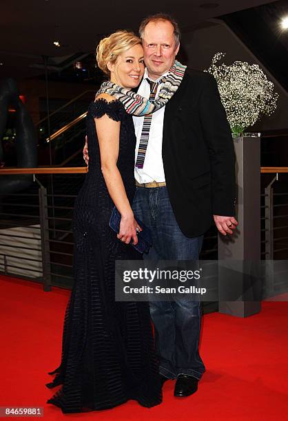 Judith Milberg and Axel Milberg attend the premiere for 'The International' as part of the 59th Berlin Film Festival at the Berlinale Palast on...