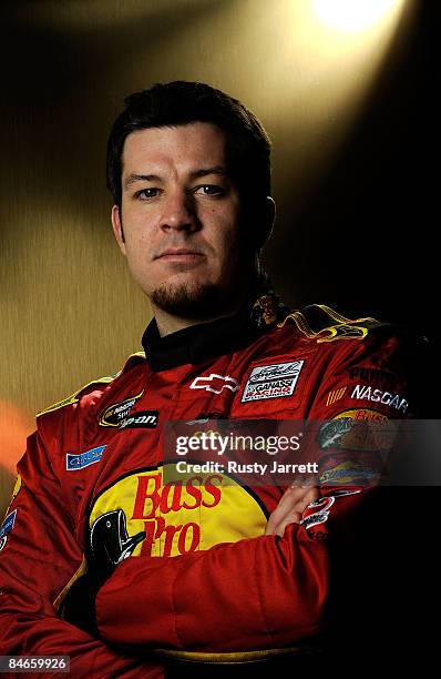 Martin Truex Jr., driver of the Bass Pro Shops/Tracker Boats Chevrolet, poses during NASCAR media day at Daytona International Speedway on February...