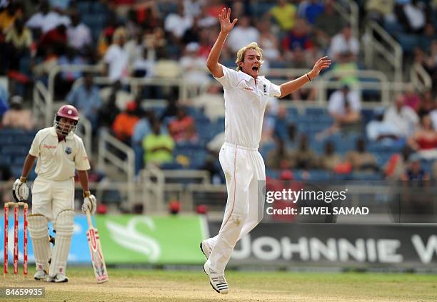 West Indies cricketer Ramnaresh Sarwan looks on as England's bowler Stuart Broad unsuccessfully appeals for dismissal decision against him during the...