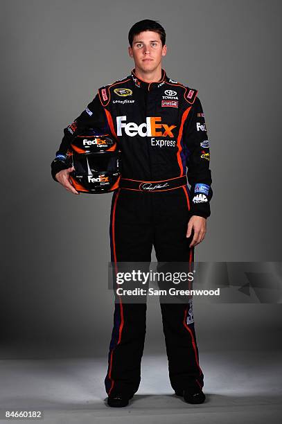 Denny Hamlin, driver of the FedEx Toyota, poses during NASCAR media day at Daytona International Speedway on February 5, 2009 in Daytona, Florida.