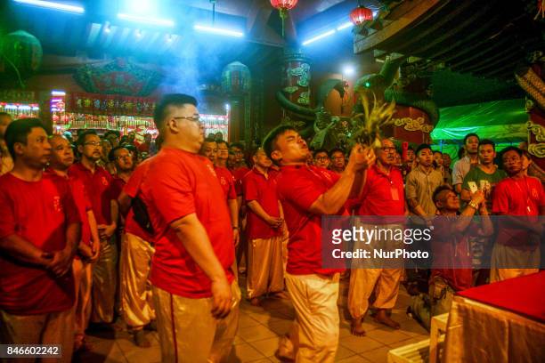 Ethnic Chinese perform a special prayer during the Hungry Ghost Festival in Teluk Pulai Klang, Malaysia on September 12, 2017.