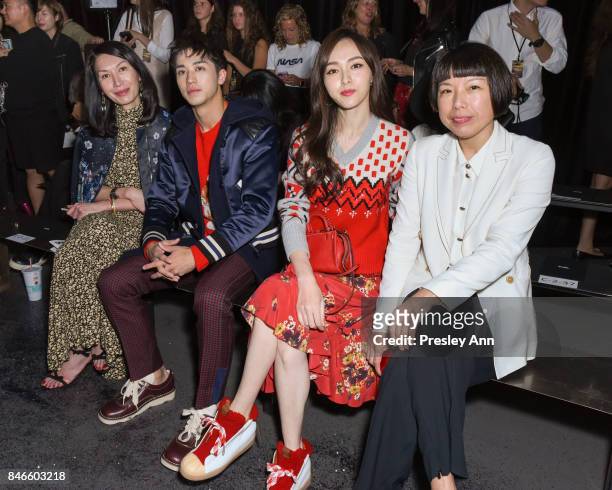 Guest,Timmy Xu, Tiffany Tang, Angelica Cheung attends Coach Spring 2018 fashion show during New York Fashion Week at Basketball City - Pier 36 -...