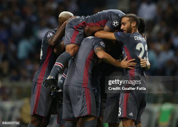 Besiktas forward Ryan Babel celebrates with teammates after scoring a goal during the UEFA Champions League match between FC Porto and Besiktas JK at...