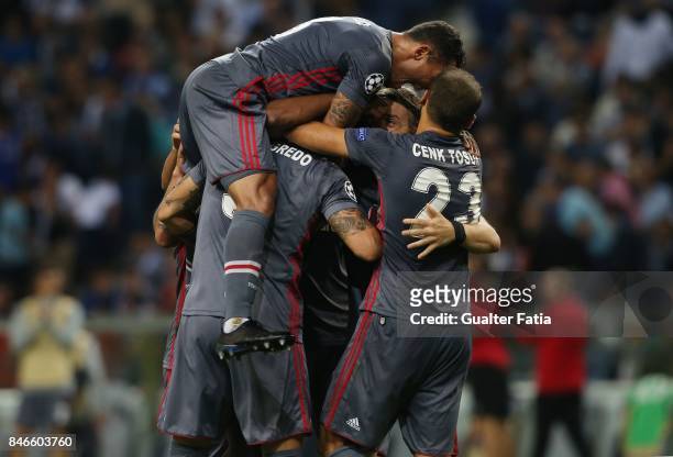Besiktas forward Ryan Babel celebrates with teammates after scoring a goal during the UEFA Champions League match between FC Porto and Besiktas JK at...