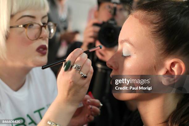 Model gets ready backstage at the Zang Toi fashion show during New York Fashion Week: The Shows at Gallery 3, Skylight Clarkson Sq on September 13,...