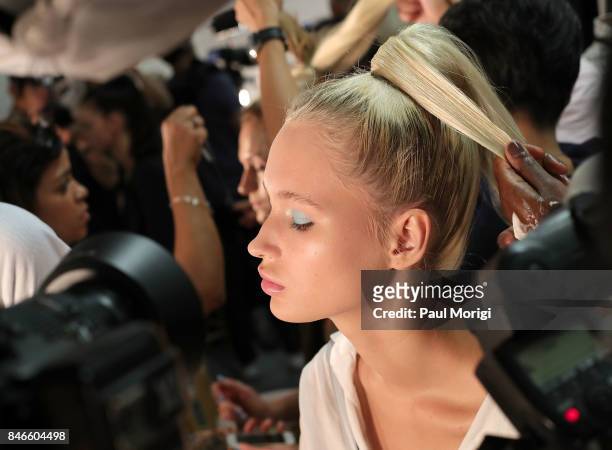 Model gets ready backstage at the Zang Toi fashion show during New York Fashion Week: The Shows at Gallery 3, Skylight Clarkson Sq on September 13,...