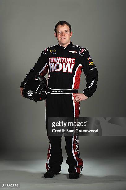 Regan Smith, driver of the Furniture Row Chevrolet, poses during NASCAR media day at Daytona International Speedway on February 5, 2009 in Daytona,...
