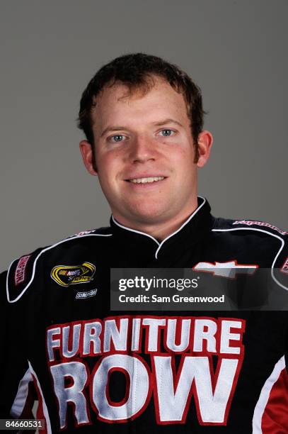 Regan Smith, driver of the Furniture Row Chevrolet, poses during NASCAR media day at Daytona International Speedway on February 5, 2009 in Daytona,...