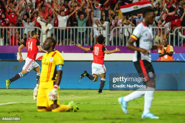 Mohamed Salah Egypt's celebrates his goal against Uganda during the FIFA World Cup 2018 qualification football match between Egypt and Uganda at the...