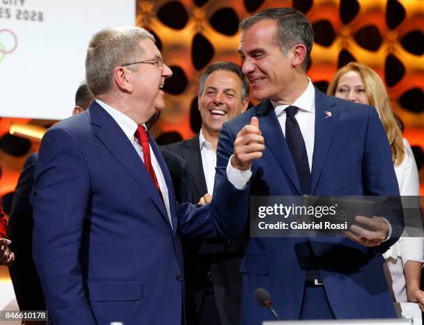 President Thomas Bach and Los Angeles Mayor Eric Garcetti laugh during the131th IOC Session - 2024 & 2028 Olympics Hosts Announcement at Lima...