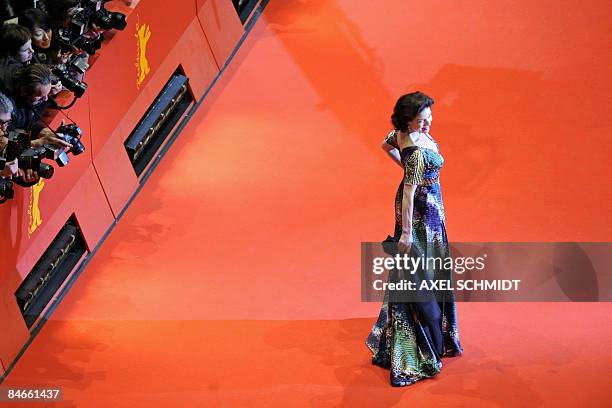 German actress Gudrun Landgrebe poses on the red carpet ahead of the premiere of the film "The International" by German director Tom Tykwer on the...