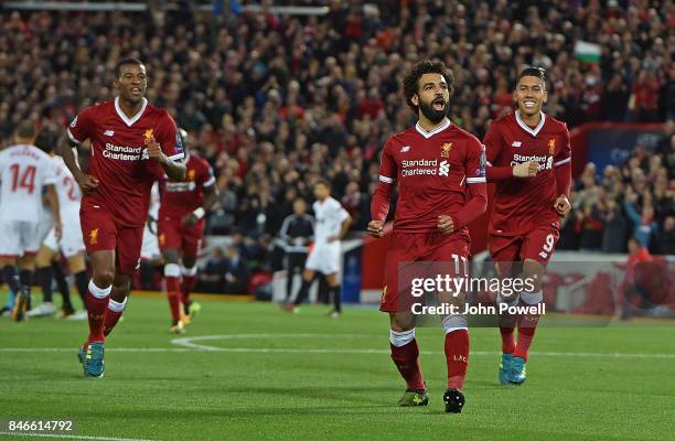 Mohamed Salah of Liverpool celebrates after scoring during the UEFA Champions League group E match between Liverpool FC and Sevilla FC at Anfield on...