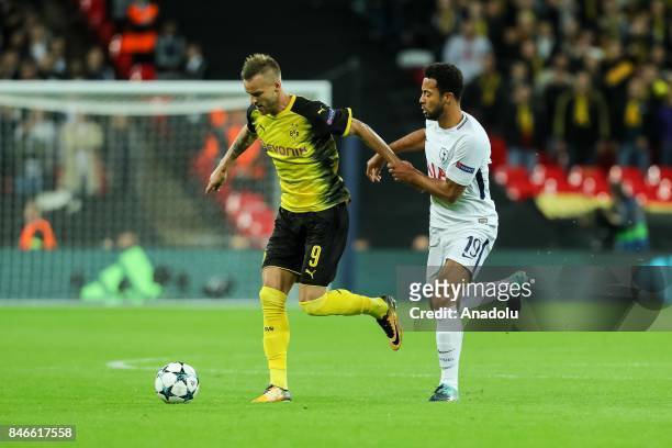 Andrey Yarmolenko of Dortmund and Mousa Dembele of Tottenham Hotspur battle for the ball during the UEFA Champions League group H match between...