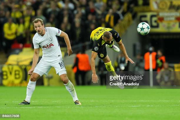 Harry Kane of Tottenham Hotspur and Omer Toprak of Dortmund battle for the ball during the UEFA Champions League group H match between Tottenham...