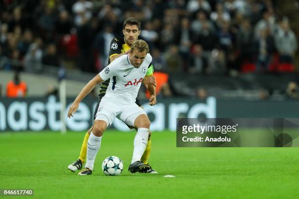 Harry Kane of Tottenham Hotspur and Sokratis of Dortmund battle for the ball during the UEFA Champions League group H match between Tottenham Hotspur...