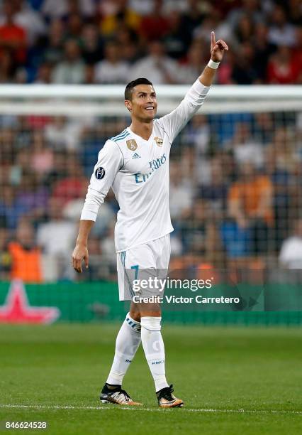 Cristiano Ronaldo of Real Madrid celebrates after scoring his team's second goal during the UEFA Champions League group H match between Real Madrid...