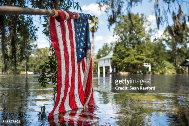 Floodwaters from Hurricane Irma recede September 13, 2017 in Middleburg, Florida. Flooding in town from the Black Creek topped the previous high...