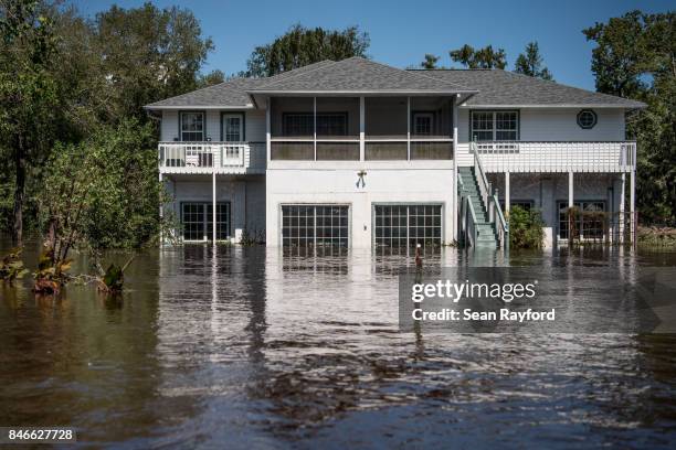 Floodwaters from Hurricane Irma recede September 13, 2017 in Middleburg, Florida. Flooding in town from the Black Creek topped the previous high...