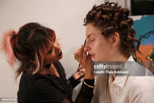 Model prepares backstage for the Marcel Ostertag fashion show during New York Fashion Week: The Shows at Gallery 3, Skylight Clarkson Sq on September...