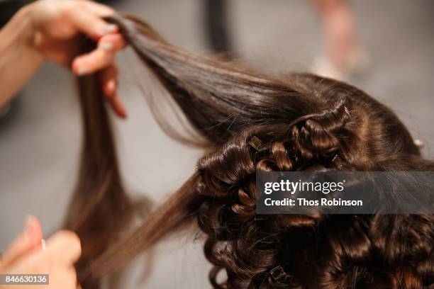 Model prepares backstage for the Marcel Ostertag fashion show during New York Fashion Week: The Shows at Gallery 3, Skylight Clarkson Sq on September...