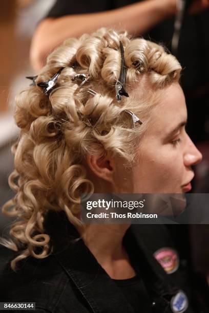 Model prepares backstage for the Marcel Ostertag fashion show during New York Fashion Week: The Shows at Gallery 3, Skylight Clarkson Sq on September...