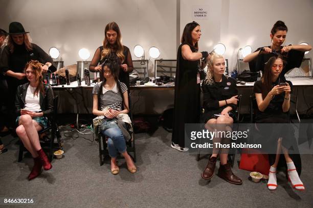 Models prepare backstage for the Marcel Ostertag fashion show during New York Fashion Week: The Shows at Gallery 3, Skylight Clarkson Sq on September...