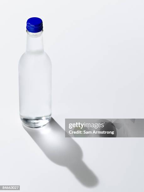 glass bottle of water. - drinking water bottle on white stock pictures, royalty-free photos & images