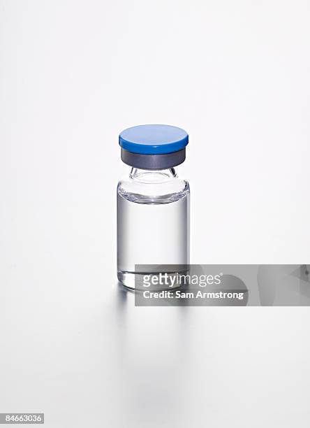 glass vial on a white background. - reagenzglas stock-fotos und bilder
