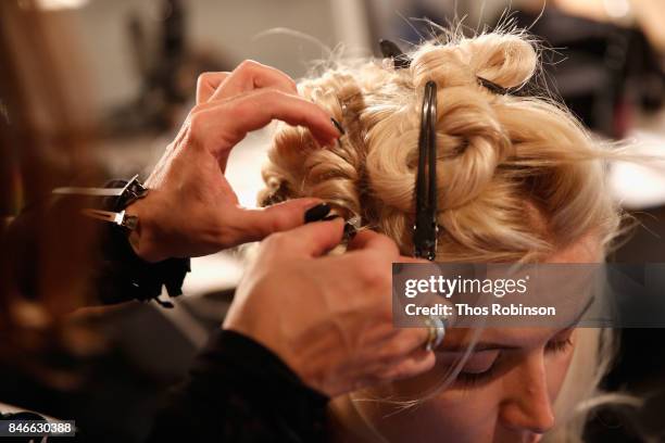 Model prepares backstage for the Marcel Ostertag fashion show during New York Fashion Week: The Shows at Gallery 3, Skylight Clarkson Sq on September...