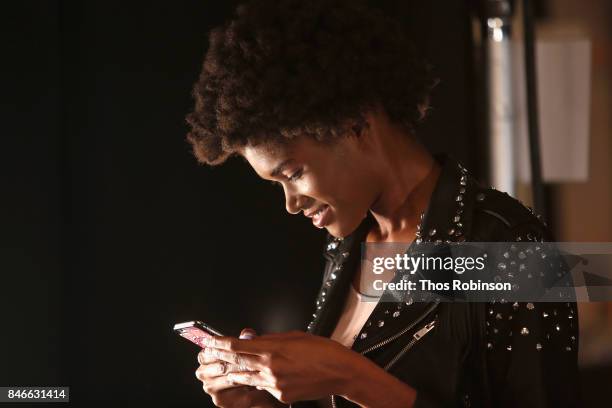 Model prepares backstage for the Marcel Ostertag fashion show during New York Fashion Week: The Shows at Gallery 3, Skylight Clarkson Sq on September...