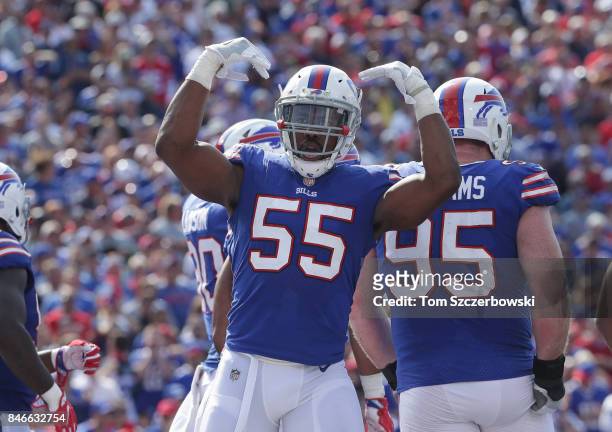 Jerry Hughes of the Buffalo Bills tries to fire up the fans during NFL game action against the New York Jets at New Era Field on September 10, 2017...