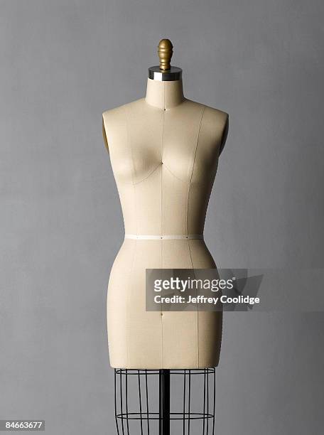 dress form on grey background - mannequin imagens e fotografias de stock