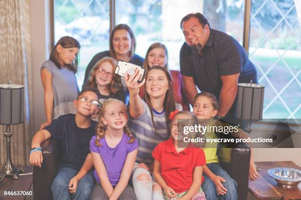 selfie smart phone camera photos - foster care stock pictures, royalty-free photos & images