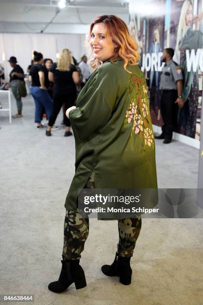 Host Liz Black poses for a photo at the Jordyn Woods meet & greet at Addition Elle on September 13, 2017 in New York City.