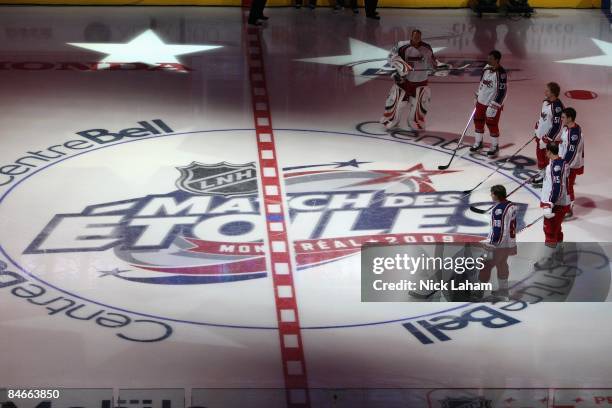 Jean-Sebastien Giguere, Scott Niedermayer, Brian Campbell, Jonathan Toews, Ryan Getzlaf and Patrick Kane of the Western Conference All-Stars stand at...