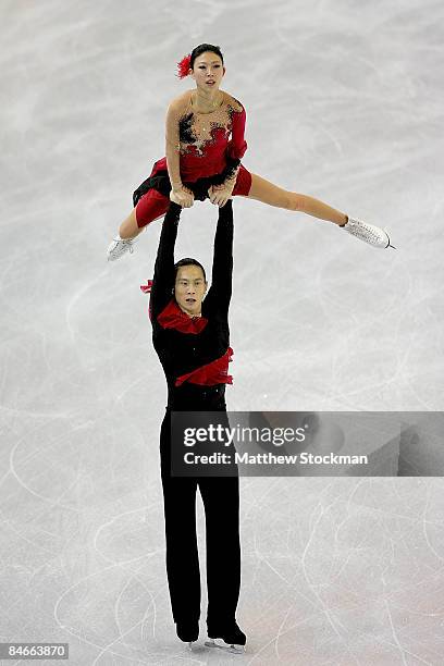 Qing Pang and Jian Tong of China skate in the Pairs Free Skate during the ISU Four Continents Figure Skating Championships at Pacific Coliseum...