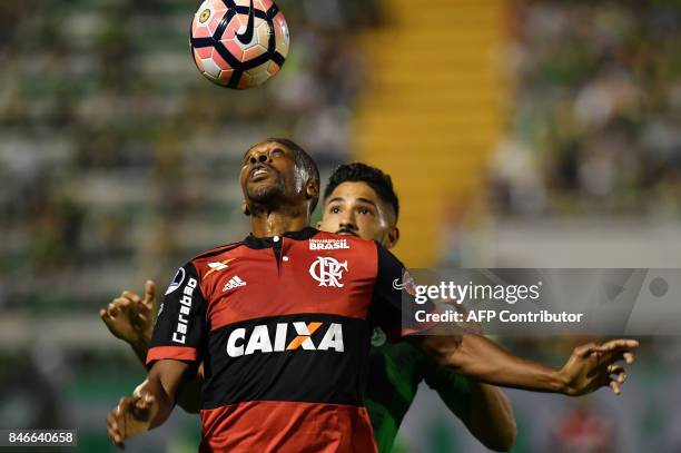 Juan of Brazil's Flamengo vies for the ball with Tulio De Melo of Brazils Chapecoense during their 2017 Copa Sudamericana football match held at...