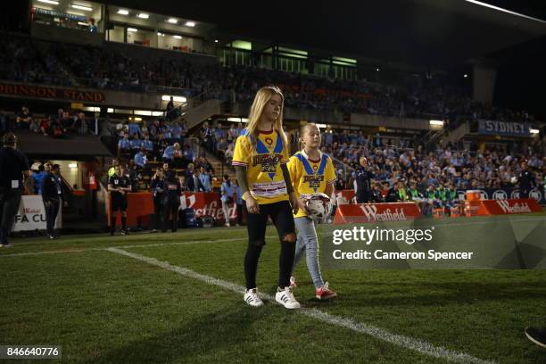 Donate Life Match Ball Presentation winners enter the field during the FFA Cup Quarter Final match between Sydney FC and Melbourne City at Leichhardt...