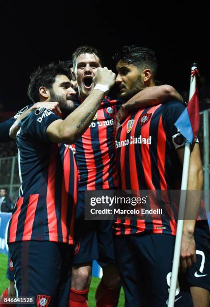 Nicolas Blandi of San Lorenzo celebrates with Bautista Merlini and Ezequiel Cerutti after scoring the second goal of his team with Ezequiel Cerutti...