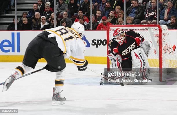 Brian Elliott of the Ottawa Senators makes a save pad against a wristshot by Phil Kessel of the Boston Bruins at Scotiabank Place on February 5, 2009...