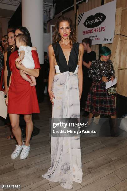 Actress/designer, Alysia Reiner, poses backstage at the Livari By Alysia Reiner, Claudine De Sola & Tabitha St. Bernard-Jacobs fashion show during...