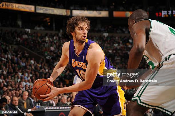 Pau Gasol of the Los Angeles Lakers looks to make a pass against Kendrick Perkins of the Boston Celtics on February 5, 2009 at the TD Banknorth...