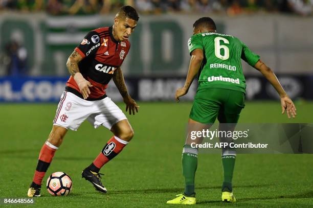 Guerrero of Brazil's Flamengo vies for the ball with Reinaldo of Brazils Chapecoense during their 2017 Copa Sudamericana football match held at Arena...