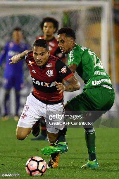Guerrero of Brazil's Flamengo vies for the ball with Lucas Mineiro of Brazils Chapecoense during their 2017 Copa Sudamericana football match held at...