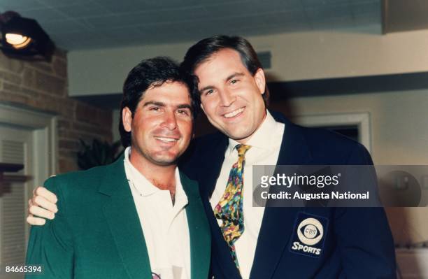 Masters Champion Fred Couples poses with CBS Sports announcer Jim Nantz during the 1992 Masters Tournament at Augusta National Golf Club on April...