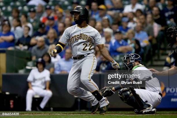 Andrew McCutchen of the Pittsburgh Pirates hits his 200th career home run during the first inning against the Milwaukee Brewers at Miller Park on...