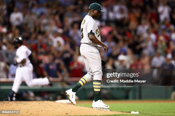 Jharel Cotton of the Oakland Athletics reacts after Jackie Bradley Jr. #19 of the Boston Red Sox hit a home run during the fifth inning at Fenway...