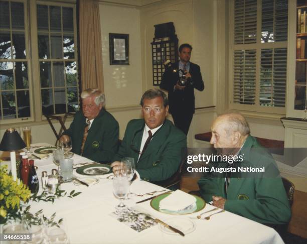 Gay Brewer, Fuzzy Zoeller and Herman Keiser converse at the Champions Dinner during the 1997 Masters Tournament at Augusta National Golf Club on...