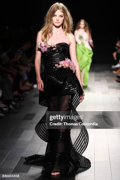 Model walks the runway wearing Marchesa Spring 2018 during New York Fashion Week on September 13, 2017 in New York City.